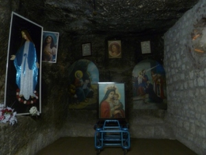 ... this cave, where the Virgin Mary is said to have appeared in an apparition. (Is that redundant?)