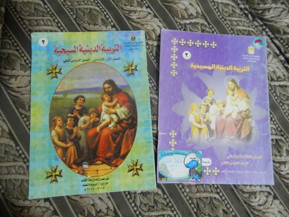 Two of Emma's religion textbooks. The main text of both reads: Christian religious education